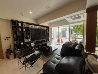 Spacious and modern living room with ample natural lighting