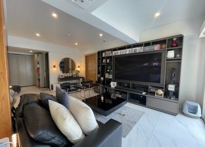 Spacious and modern living room with large entertainment unit
