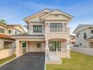 Modern two-story house with landscaped front yard and spacious driveway