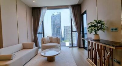 Modern living room with city view through large windows