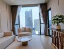 Modern living room with city view through large windows