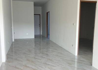 Spacious and elegant hallway with marble flooring in a modern home