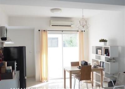 Bright and modern living room with dining area