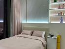 Modern bedroom with illuminated shelving and tasteful decor
