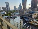 Panoramic cityscape view from the balcony of an urban apartment