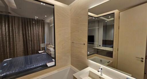 Luxurious bedroom with en-suite bathroom and mirrored wardrobes