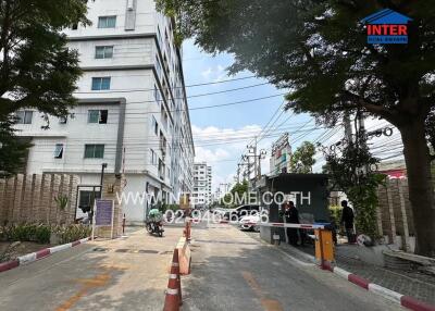 Entrance to residential building with security gate