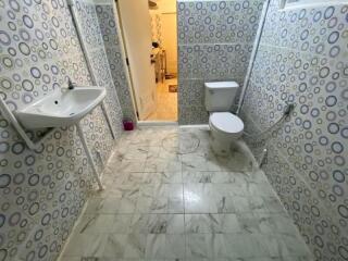 Compact bathroom with modern amenities