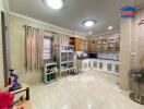 Spacious kitchen with modern appliances and ample lighting