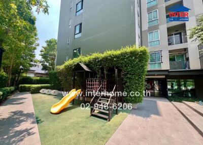 Outdoor playground with slide in a residential apartment complex