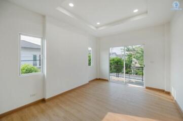 Spacious and bright living room with large windows