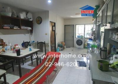 Spacious kitchen with dining area and modern appliances