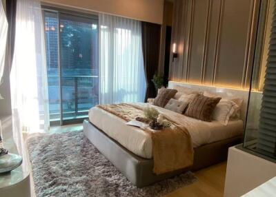 Elegant bedroom with modern decor and city view