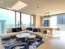 Spacious modern living room with city skyline views