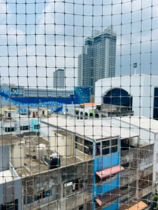 Urban landscape view through safety net