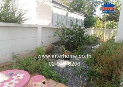 Spacious garden area with potential for landscaping in a residential property