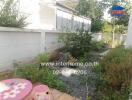 Spacious garden area with potential for landscaping in a residential property