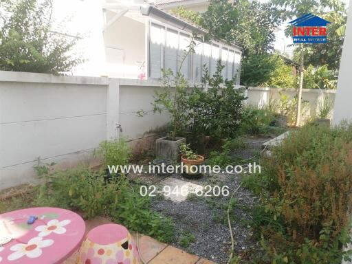 Spacious garden area with potential for landscaping in a residential property