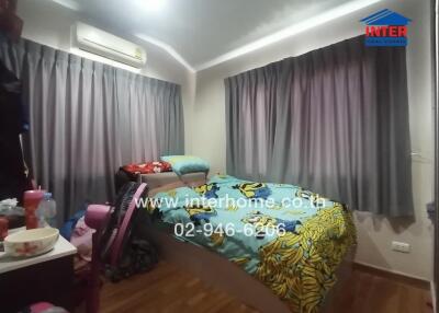 Cozy furnished bedroom with modern amenities