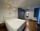 Modern bedroom with stylish lighting and minimalistic design