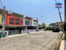 Colorful townhouses with parking spaces