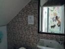 Compact bathroom with mosaic tiles