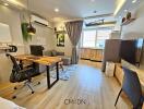 Modern and well-equipped compact living space with kitchenette, work area, and dining setup