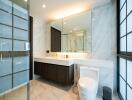 Modern bathroom with marble tiles and spacious design