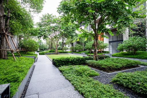 lush garden path in a modern residential complex