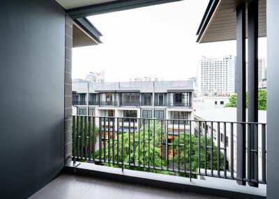 Spacious balcony with city view and ample natural lighting