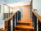 Spacious Hallway with Wooden Stairs and Modern Aesthetic