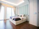 Elegant spacious bedroom with natural lighting