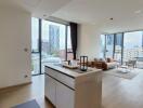 Modern living room with open kitchen and city view