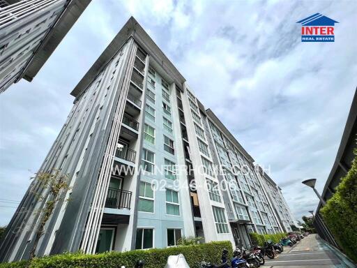 Modern residential apartment building exterior with balconies