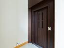 Modern wooden door in a bright minialistic corridor