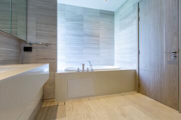 Modern bathroom with clean design and ample lighting