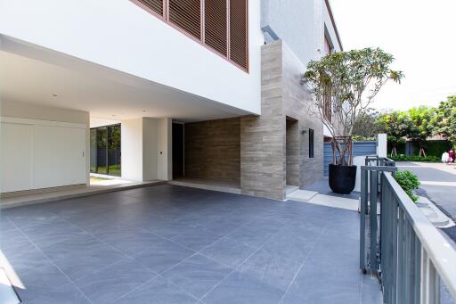 Spacious and modern outdoor driveway area of a residential building