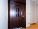 Modern dark wood apartment entrance