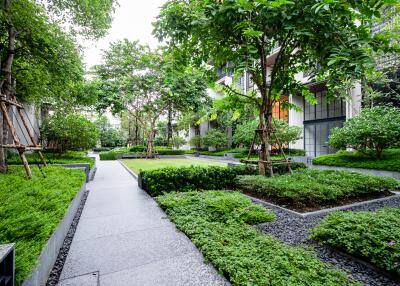 Well-maintained garden pathway within a modern residential compound