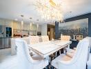 Elegant dining room with modern chandelier and open kitchen layout