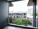 Spacious balcony with city view and protective railing