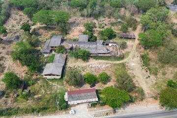 A large plot by the main road for sale in Sankhampeang, Chiang Mai