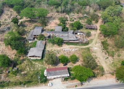 A large plot by the main road for sale in Sankhampeang, Chiang Mai