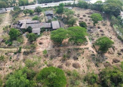 A large plot by the main road for sale in Sankhampeang, Chiang Mai