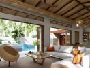 Spacious living room with a view of the pool