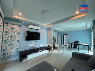 Modern and spacious living room with dining area