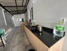 Spacious semi-outdoor kitchen with modern amenities