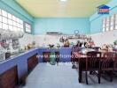 Spacious kitchen with dining area and large counter space