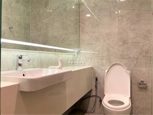 Modern bathroom interior with marble walls