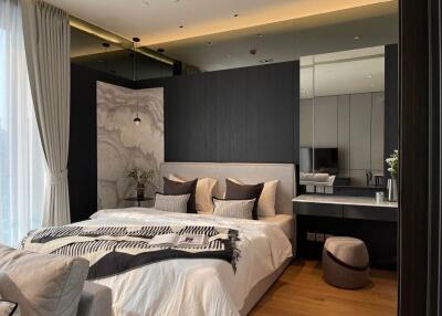 Elegant modern bedroom with integrated workspace